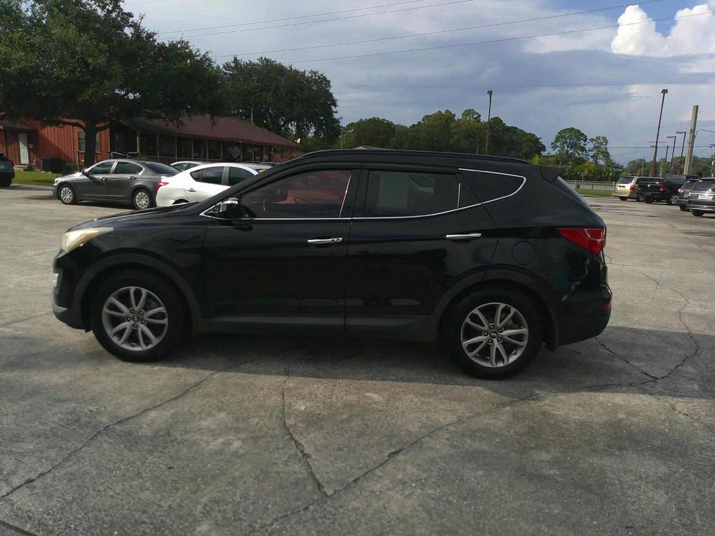 2014 BLACK HYUNDAI SANTA FE SPORT 2.0T (5XYZU3LA6EG) , located at 1200 Cassat Avenue, Jacksonville, FL, 32205, (904) 695-1885, 30.302404, -81.731033 - Photo#0